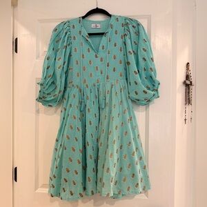 Elegant Teal Dress with Gold Accents